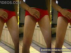 Maduro Delgado flaunts his huge cock in red underwear for Alejandro Mistral's erotic fetish video.