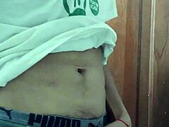 young latino pulls out his cock and strokes it real good.